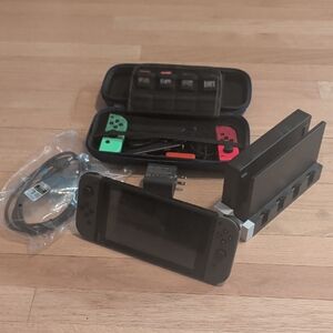 Nintendo Switch with Added Joy cons, Games, Case And Accessories